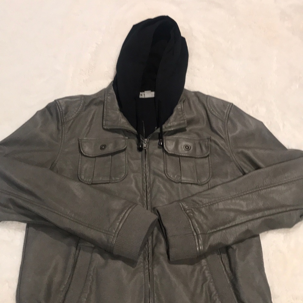 Layered jacket with attached hoodie.